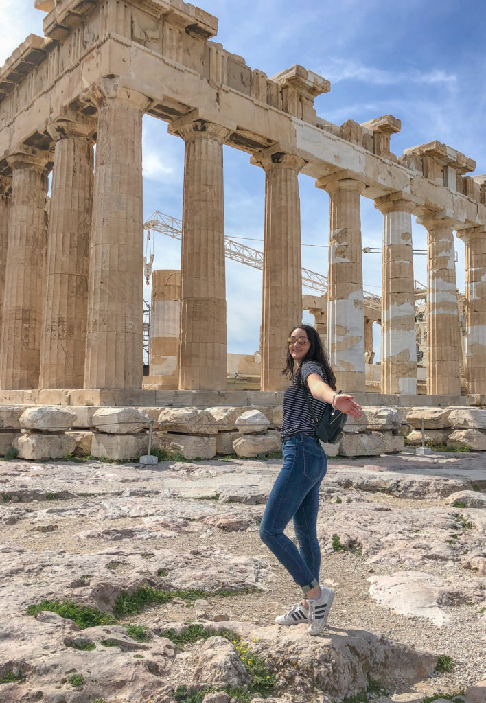 standing in front of the Parthenon